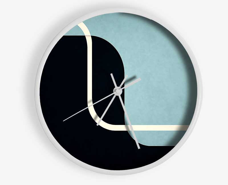 Abstract Yin Yang clock made from natural bamboo with a round face and clear Plexiglas lens, available in black, white, and natural frame colors.