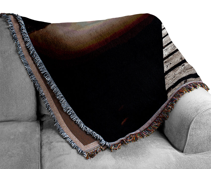 A luxurious AbstractBrown Pier throw blanket made from 100% cotton, featuring a thermal weave and rich brown color, perfect for home decor.