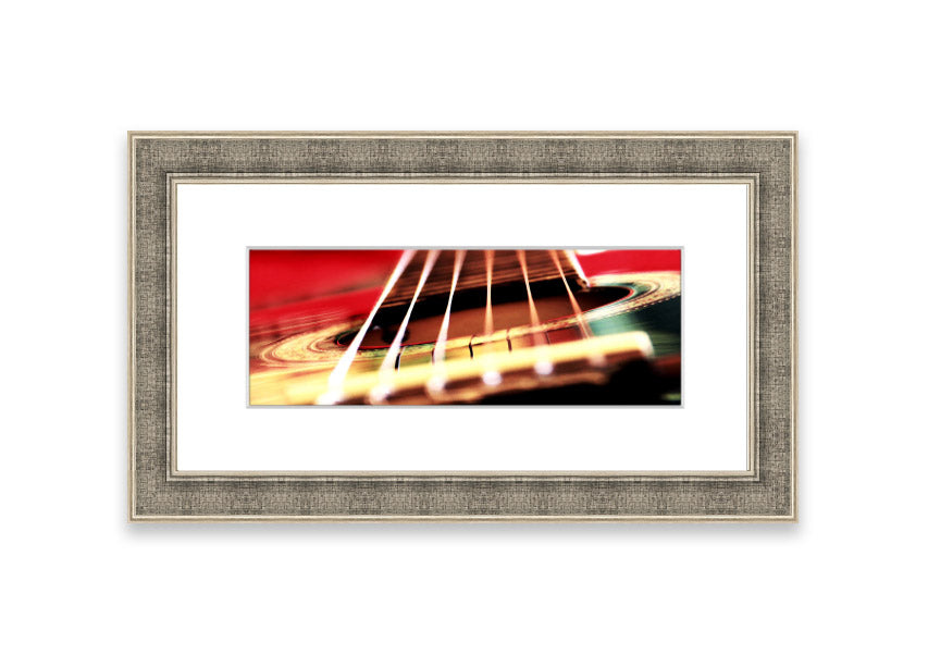 A beautifully framed print of an acoustic guitar background, showcasing intricate details and vibrant colors, ready to enhance any wall decor.