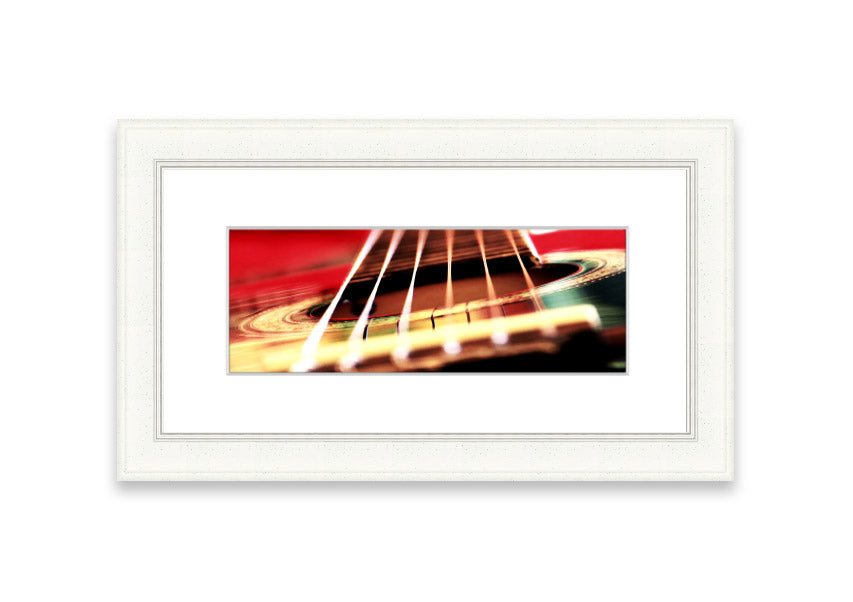 A beautifully framed print of an acoustic guitar background, showcasing intricate details and vibrant colors, ready to enhance any wall decor.