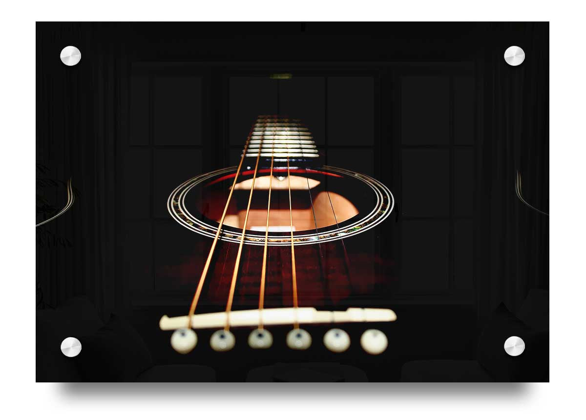 Close-up view of an acoustic guitar printed on acrylic glass, showcasing vibrant colors and intricate details.