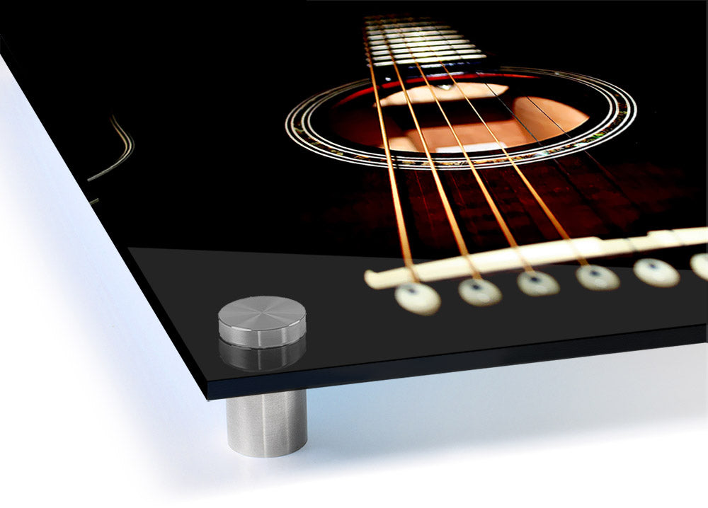 Close-up view of an acoustic guitar printed on acrylic glass, showcasing vibrant colors and intricate details.