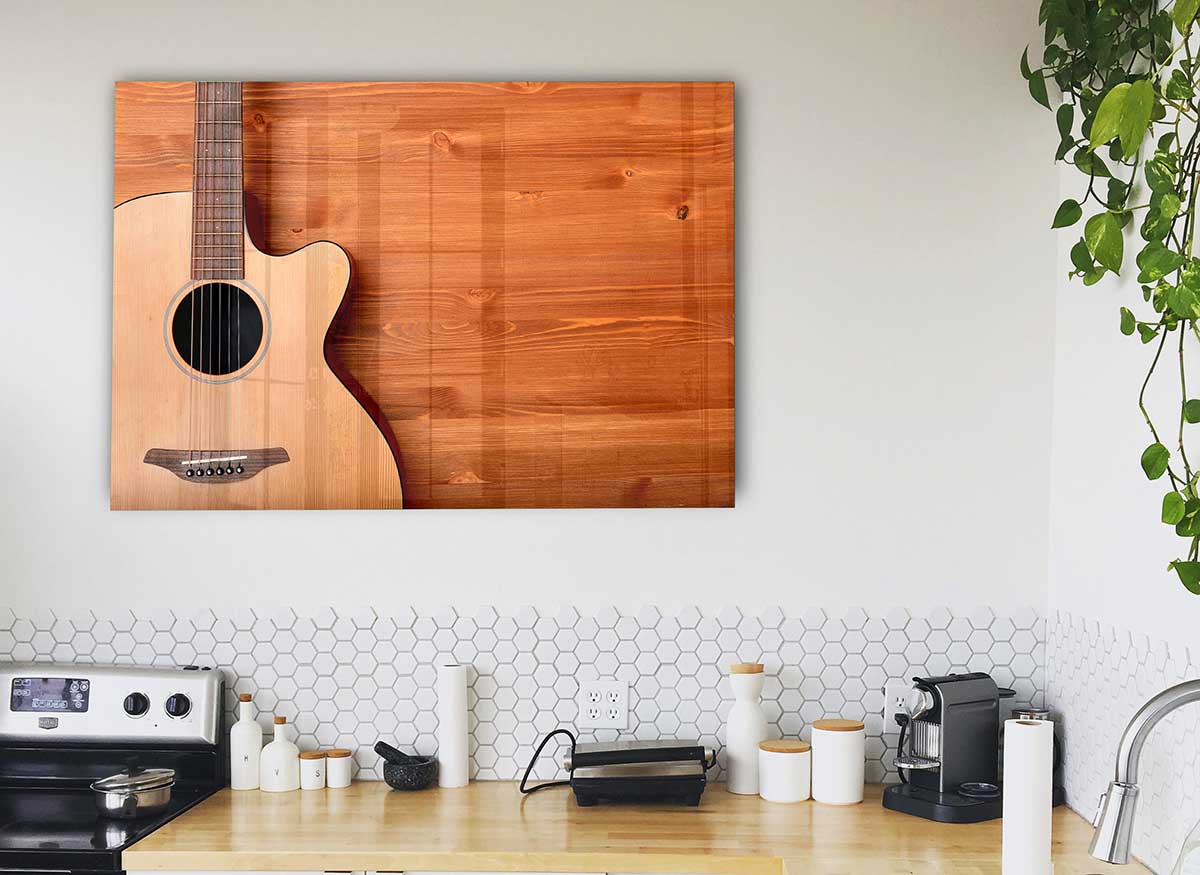 A modern glass print featuring an acoustic guitar, showcasing vibrant colors and intricate details, perfect for home decor.