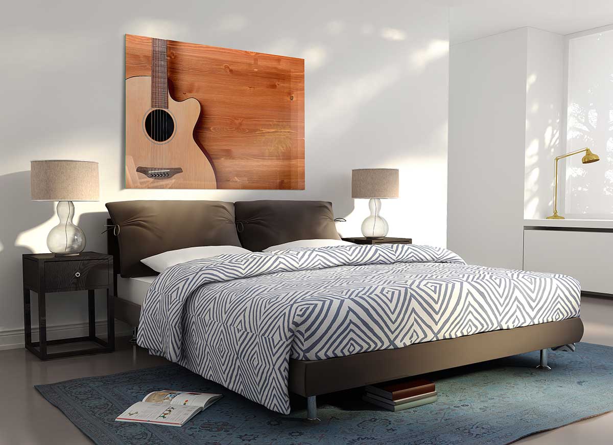 A modern glass print featuring an acoustic guitar, showcasing vibrant colors and intricate details, perfect for home decor.