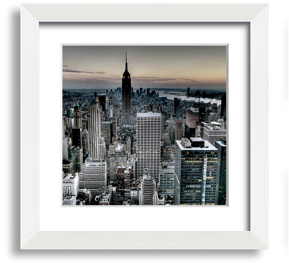 A beautifully framed print of New York City, showcasing vibrant colors and intricate details, ready to hang on the wall.