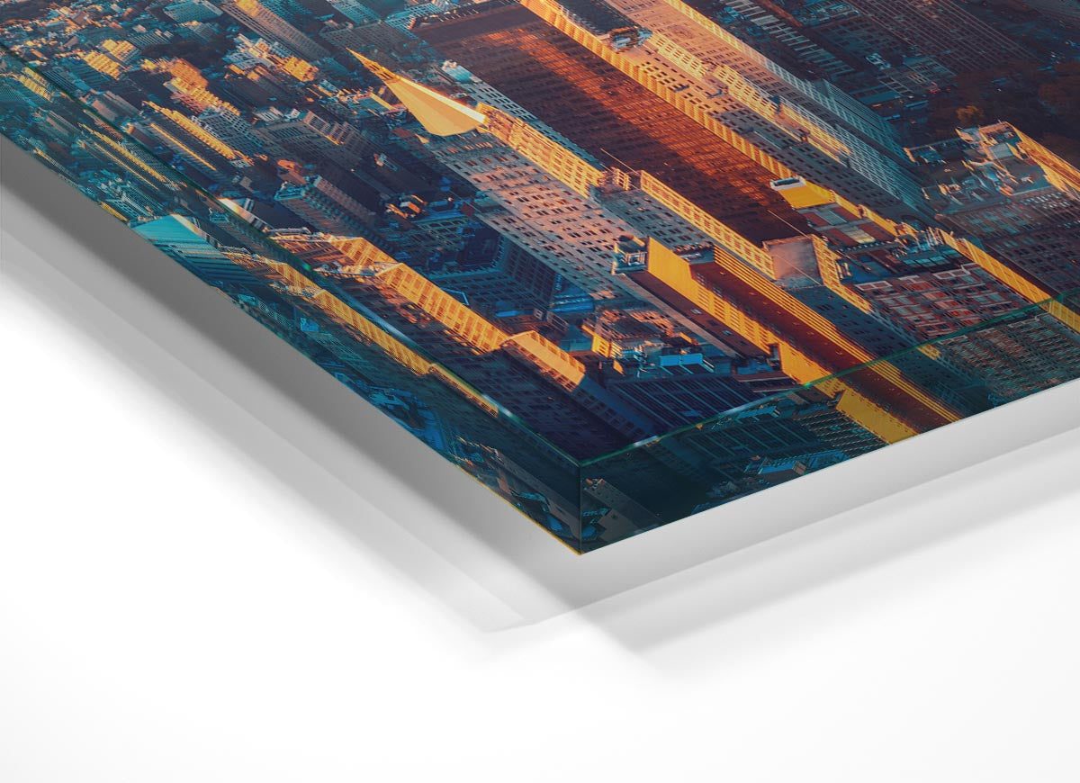 Aerial city sunset dream glass print showcasing a vibrant city skyline at sunset, perfect for modern decor.