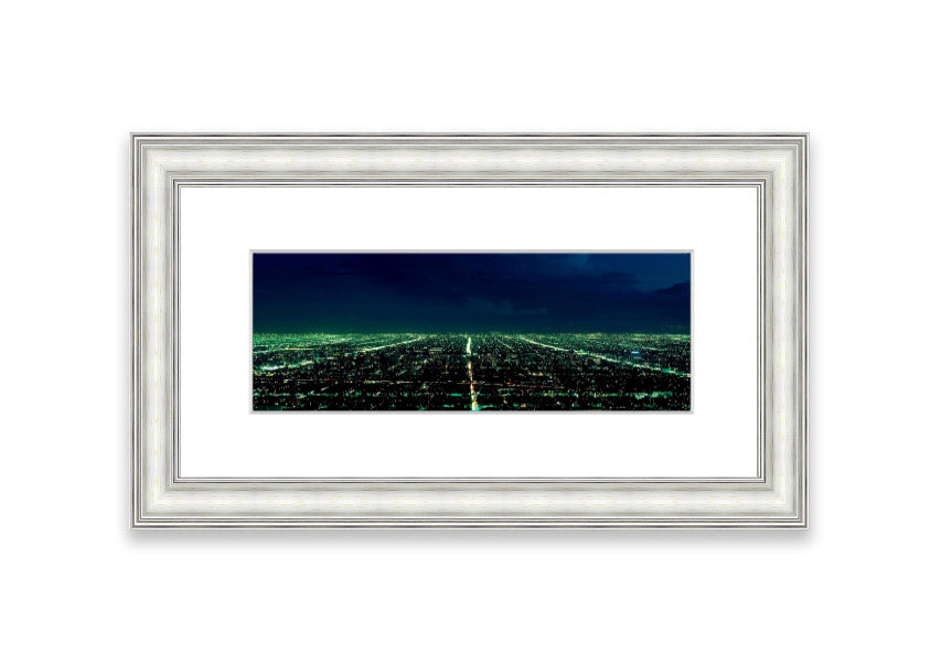 Aerial view of a city captured in a framed print, showcasing vibrant colors and intricate details, available in various frame colors.