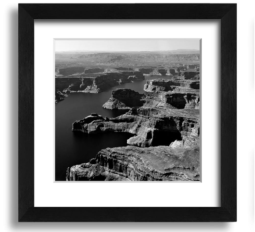 Aerial view of a canyon captured in a square framed print, showcasing vibrant colors and intricate details, ready to hang.