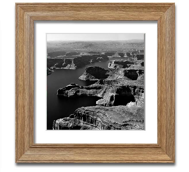 Aerial view of a canyon captured in a square framed print, showcasing vibrant colors and intricate details, ready to hang.