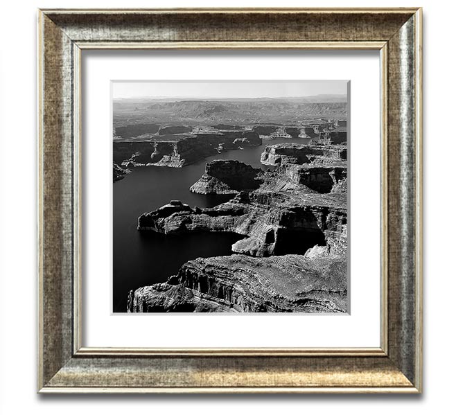 Aerial view of a canyon captured in a square framed print, showcasing vibrant colors and intricate details, ready to hang.