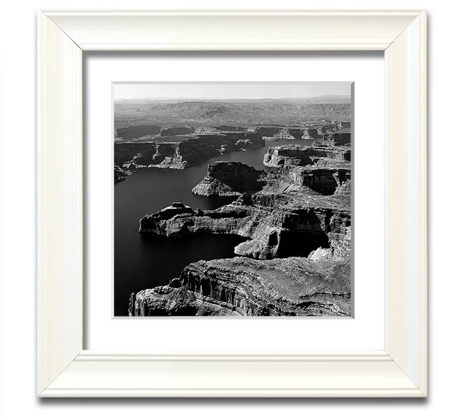 Aerial view of a canyon captured in a square framed print, showcasing vibrant colors and intricate details, ready to hang.