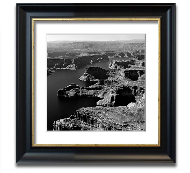 Aerial view of a canyon captured in a square framed print, showcasing vibrant colors and intricate details, ready to hang.