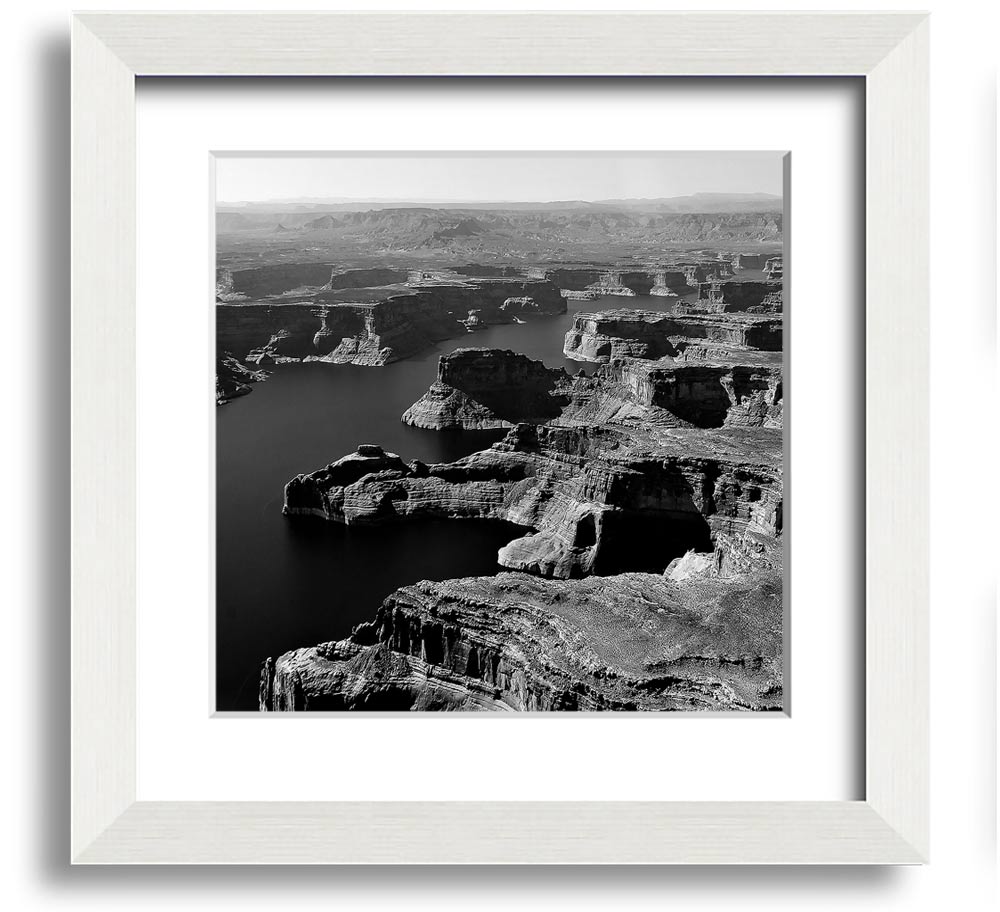 Aerial view of a canyon captured in a square framed print, showcasing vibrant colors and intricate details, ready to hang.