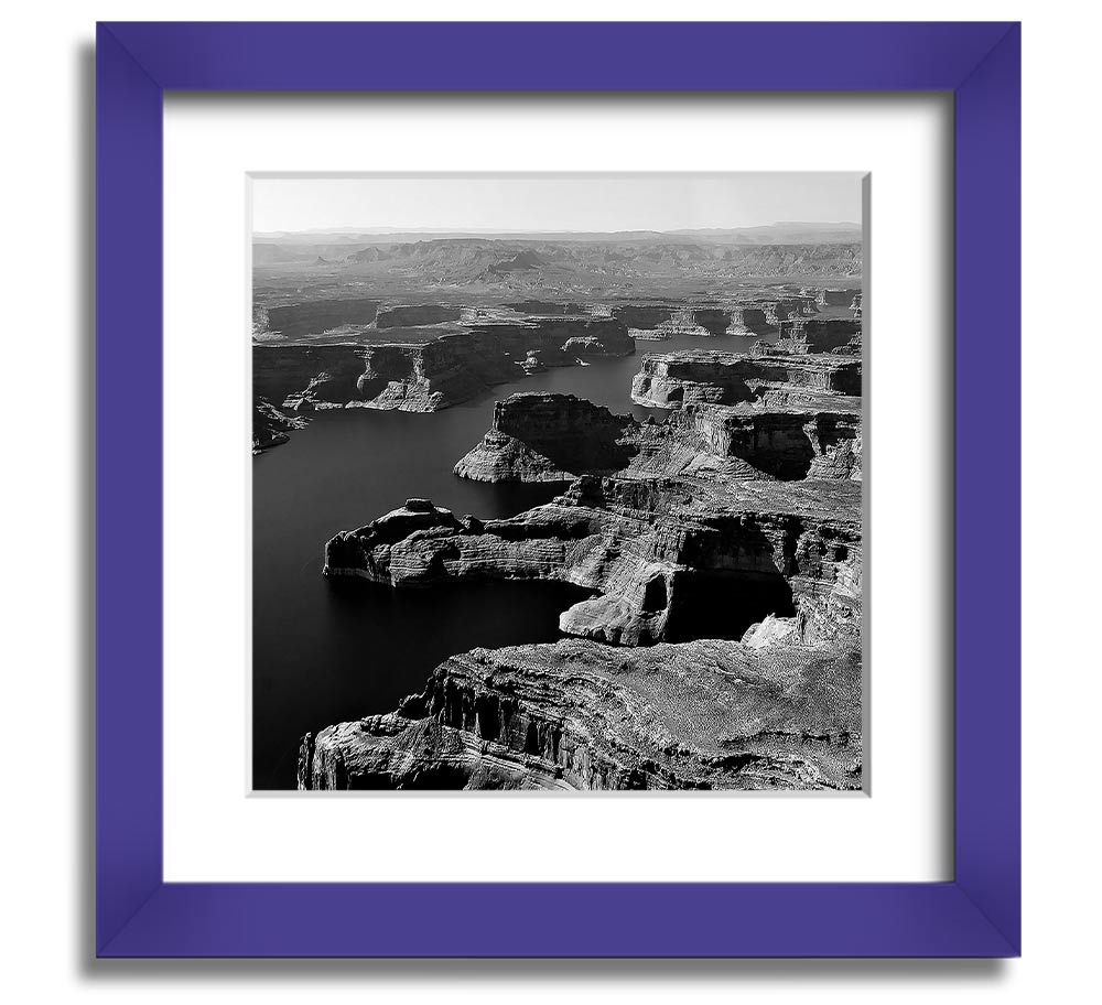 Aerial view of a canyon captured in a square framed print, showcasing vibrant colors and intricate details, ready to hang.