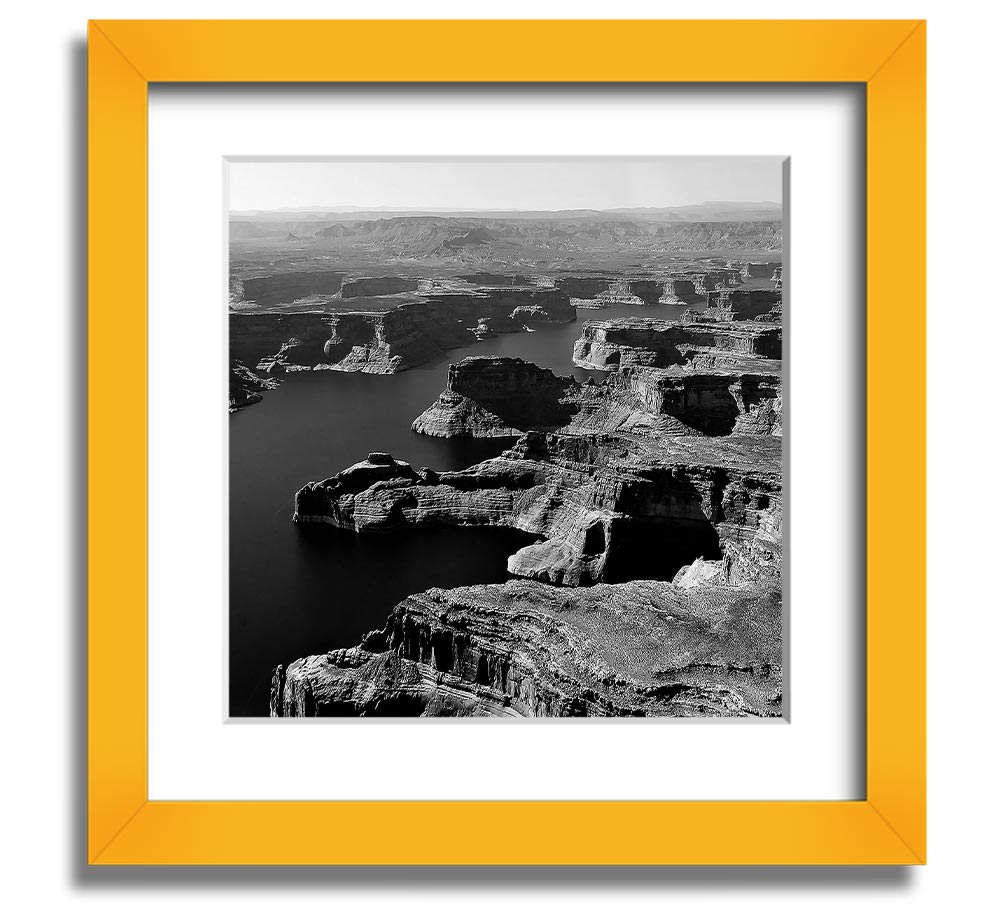 Aerial view of a canyon captured in a square framed print, showcasing vibrant colors and intricate details, ready to hang.