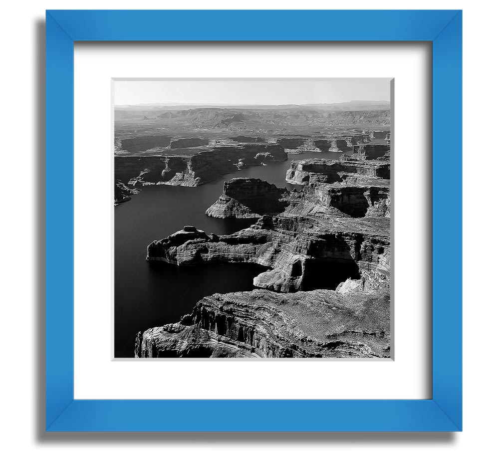 Aerial view of a canyon captured in a square framed print, showcasing vibrant colors and intricate details, ready to hang.