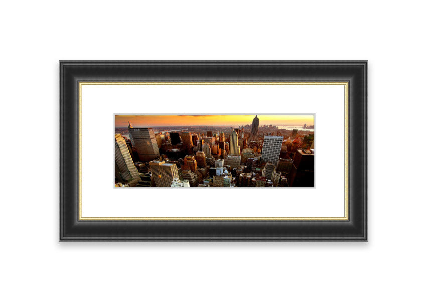 Framed print of an aerial view of New York City, showcasing the iconic skyline and vibrant cityscape.