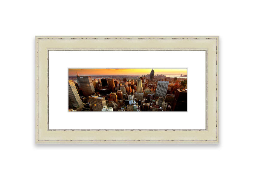 Framed print of an aerial view of New York City, showcasing the iconic skyline and vibrant cityscape.