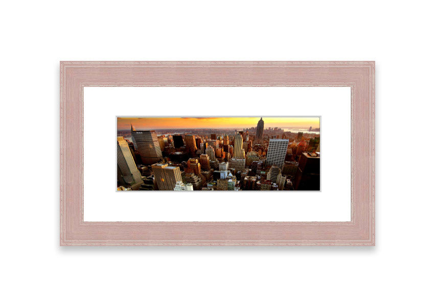 Framed print of an aerial view of New York City, showcasing the iconic skyline and vibrant cityscape.