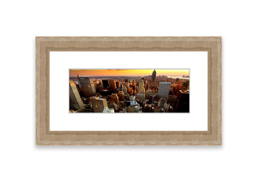 Framed print of an aerial view of New York City, showcasing the iconic skyline and vibrant cityscape.