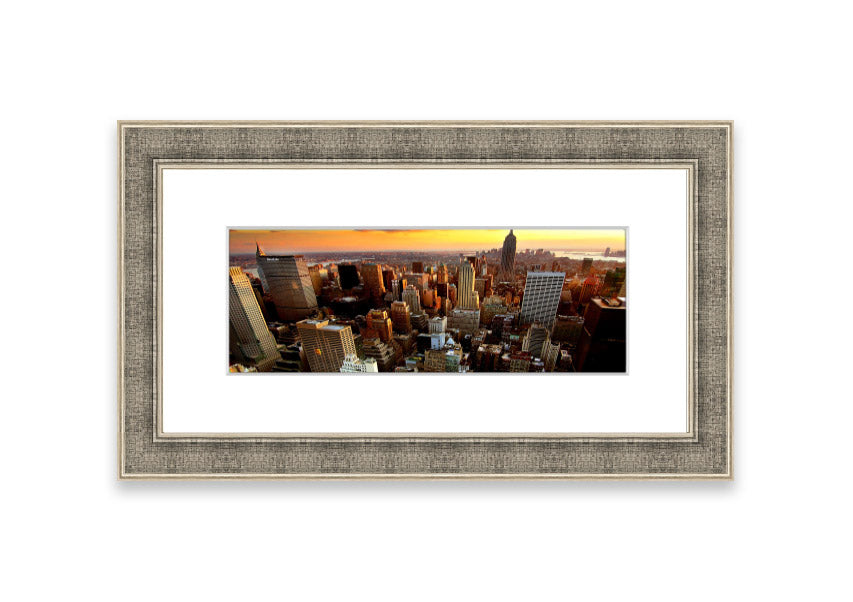 Framed print of an aerial view of New York City, showcasing the iconic skyline and vibrant cityscape.