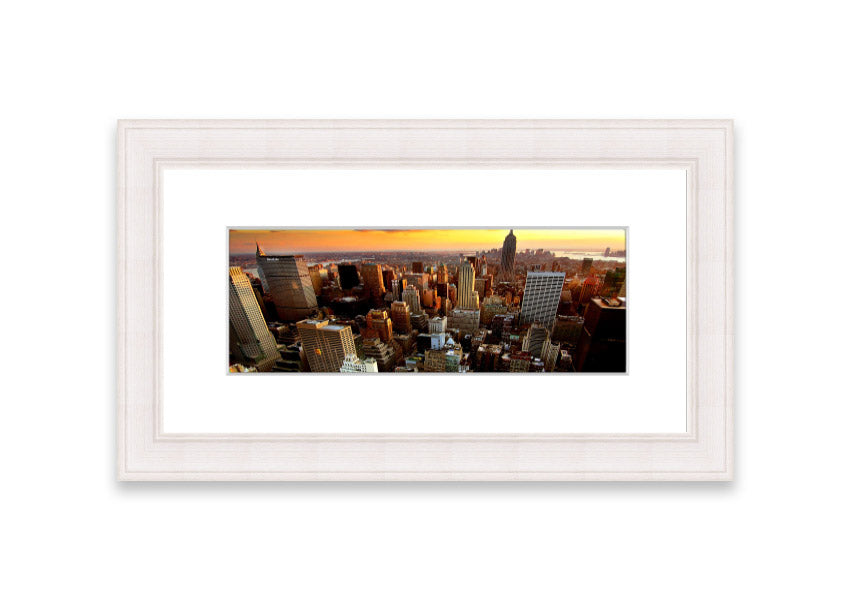 Framed print of an aerial view of New York City, showcasing the iconic skyline and vibrant cityscape.