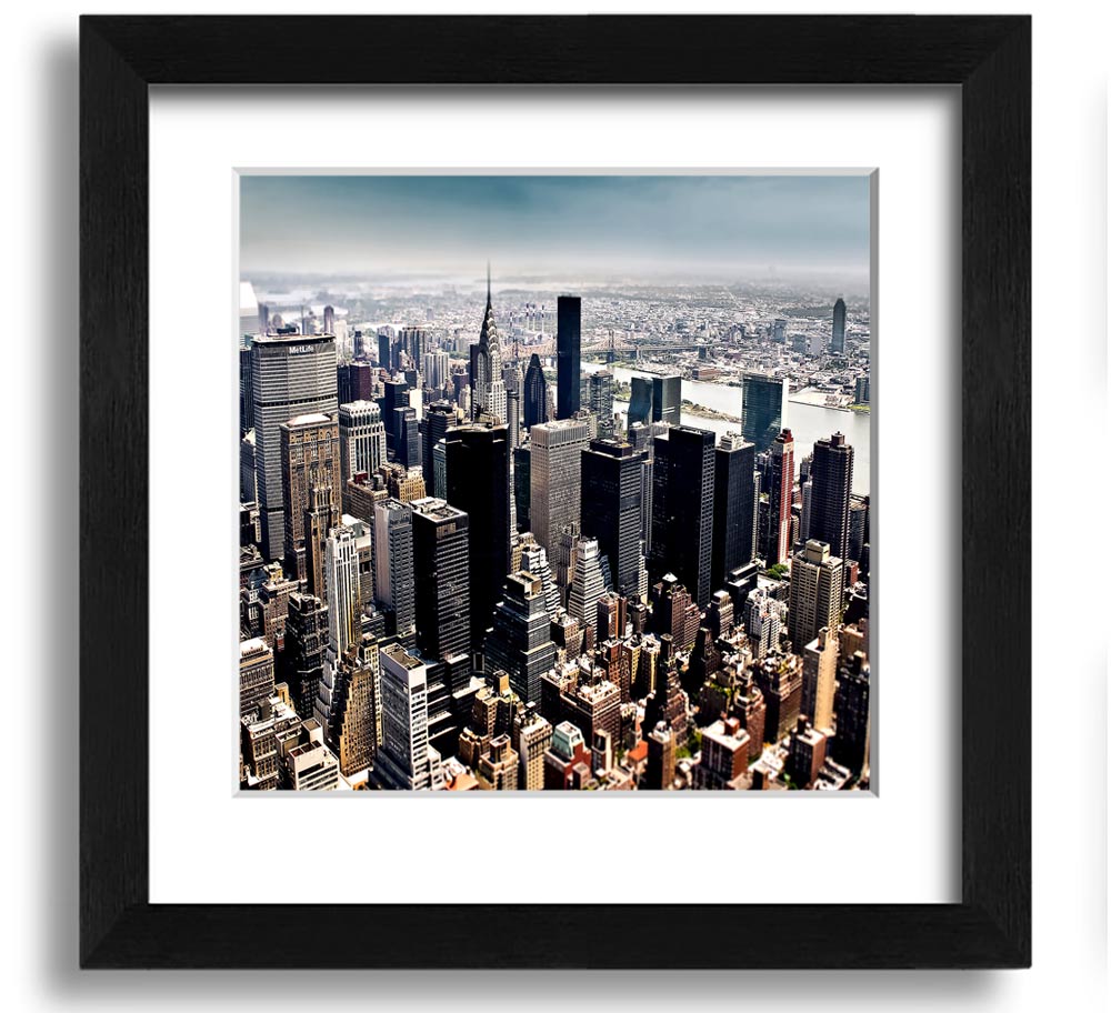 Aerial view of New York City captured in a square framed print, showcasing the iconic skyline and vibrant cityscape.