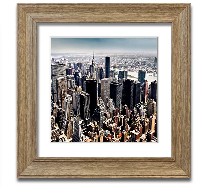 Aerial view of New York City captured in a square framed print, showcasing the iconic skyline and vibrant cityscape.