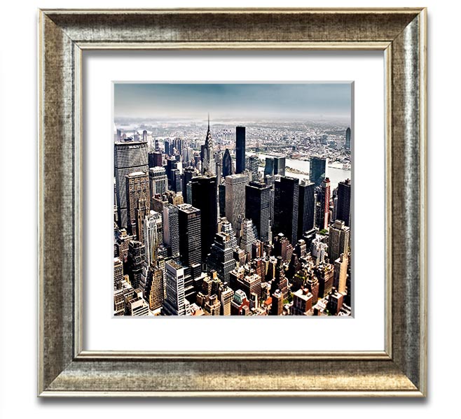 Aerial view of New York City captured in a square framed print, showcasing the iconic skyline and vibrant cityscape.