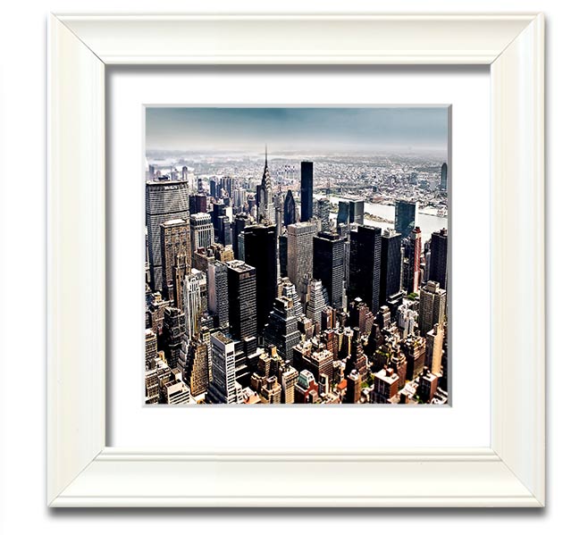 Aerial view of New York City captured in a square framed print, showcasing the iconic skyline and vibrant cityscape.