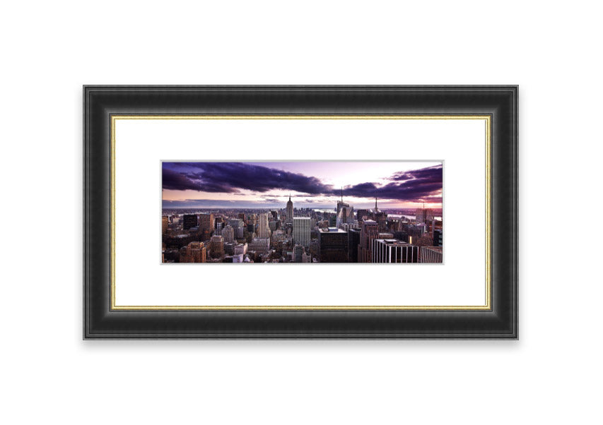 Framed print of New York City skyline at dusk, showcasing vibrant colors and intricate details.