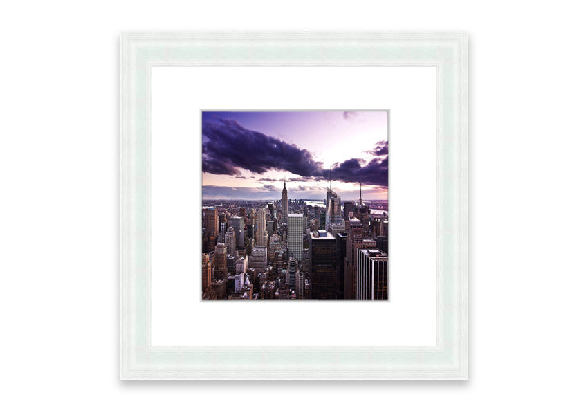 Framed print of New York City skyline at dusk, showcasing vibrant colors and intricate details.