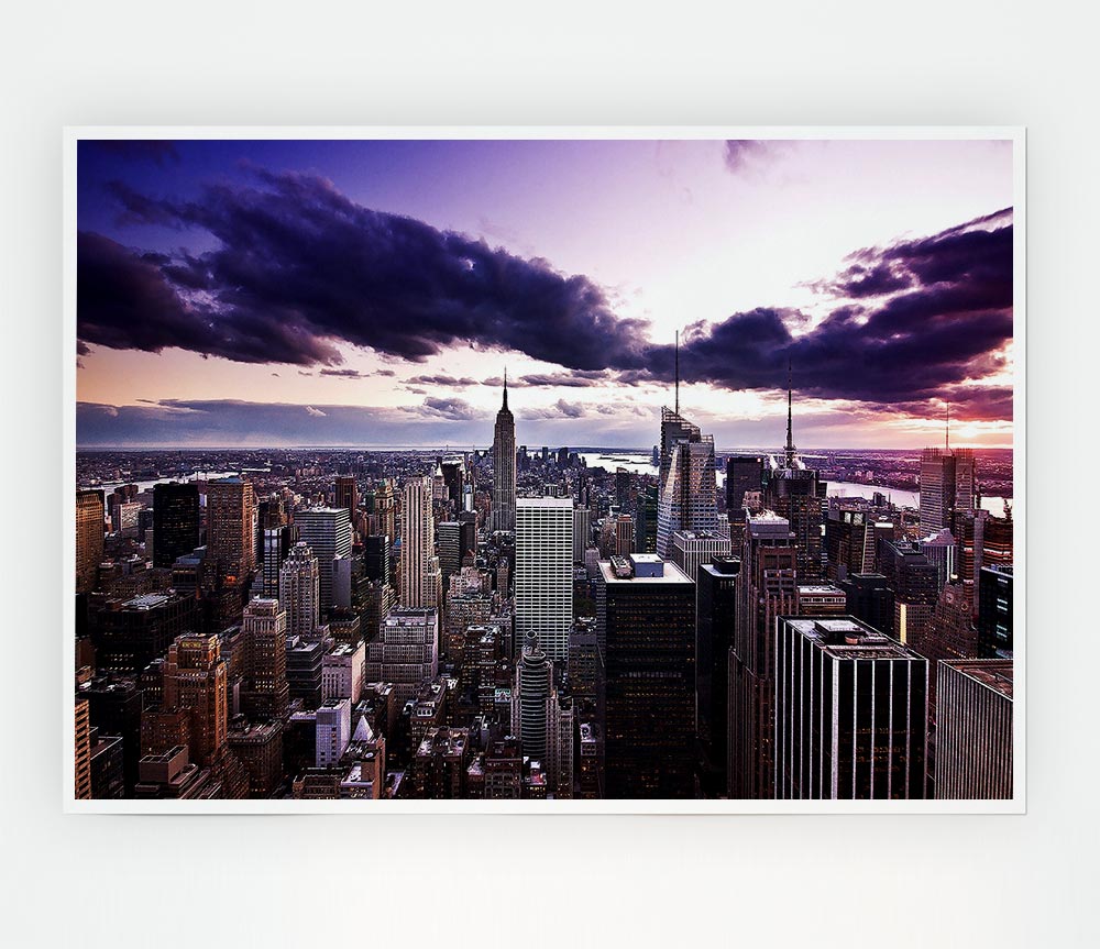 Aerial view of New York City skyline at dusk, showcasing vibrant colors and iconic buildings.