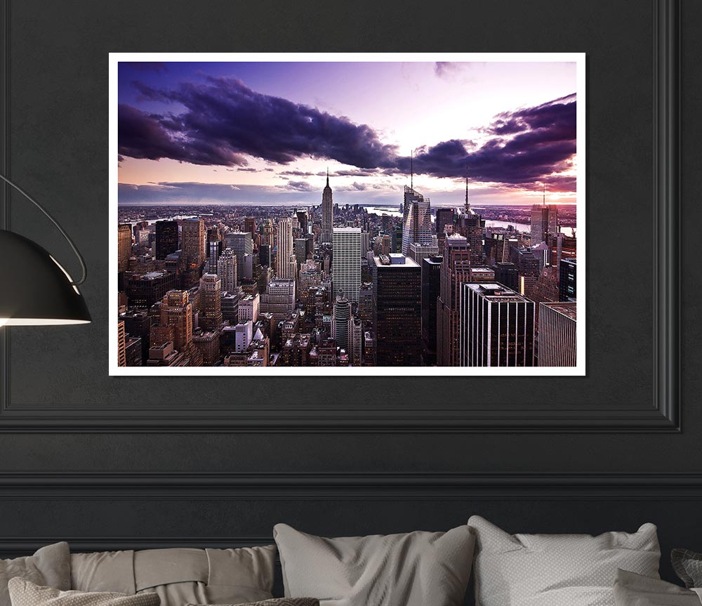 Aerial view of New York City skyline at dusk, showcasing vibrant colors and iconic buildings.