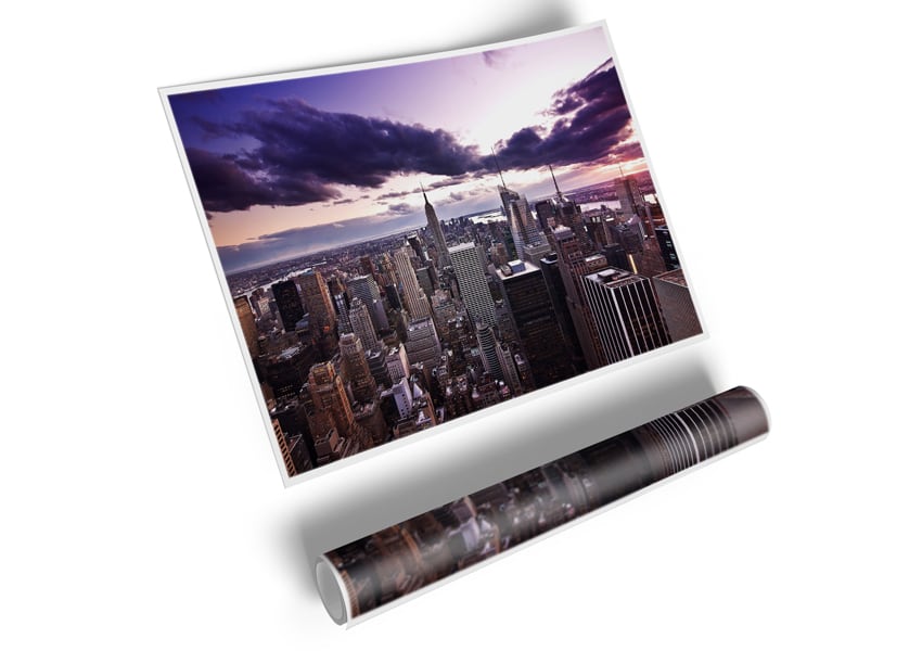 Aerial view of New York City skyline at dusk, showcasing vibrant colors and iconic buildings.