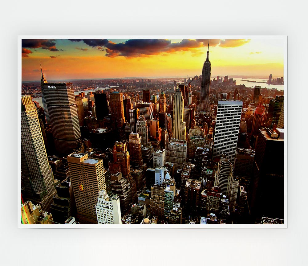 Aerial view of New York City at sunset, showcasing vibrant colors over the skyline.