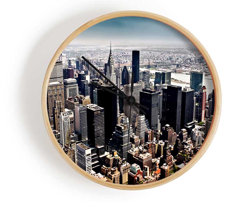 Aerial View of New York City clock made from natural bamboo with a round face and clear Plexiglas lens, showcasing a vibrant cityscape.