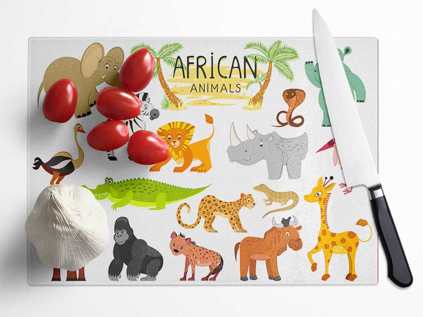 A vibrant chopping board featuring cartoon illustrations of African animals, made from durable tempered glass with an anti-slip base.