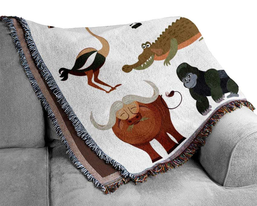 A colorful throw blanket featuring cartoon illustrations of various African animals, made from 100% cotton with a thermal weave.