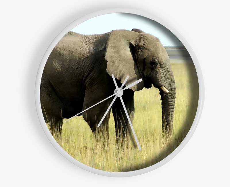 Stylish African Elephant Namibia clock made from natural bamboo with a round face and clear Plexiglas lens.