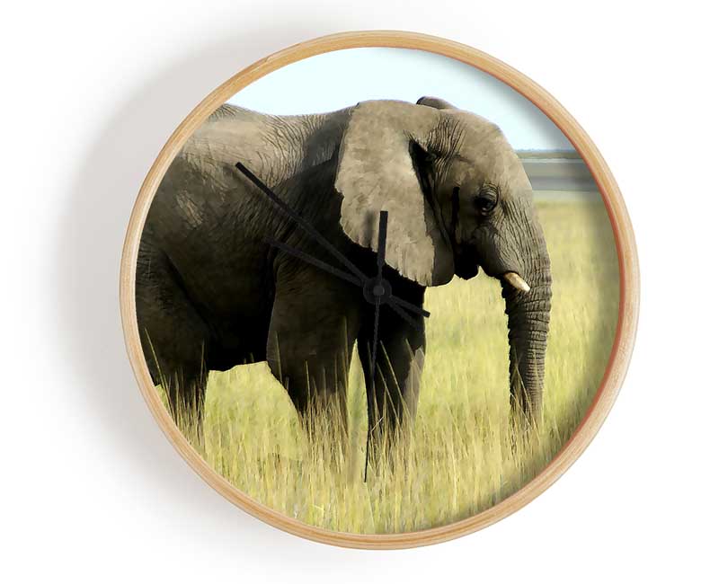 Stylish African Elephant Namibia clock made from natural bamboo with a round face and clear Plexiglas lens.