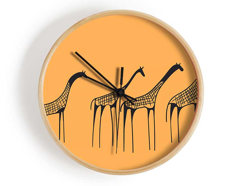 A stylish African Giraffe clock made from natural bamboo, featuring a round face and clear Plexiglas lens, available in multiple colors.