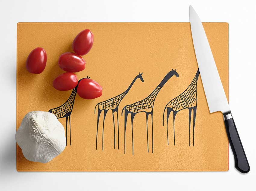 A stylish African Giraffe chopping board made from tempered glass with a chinchilla ripple effect and anti-slip feet.