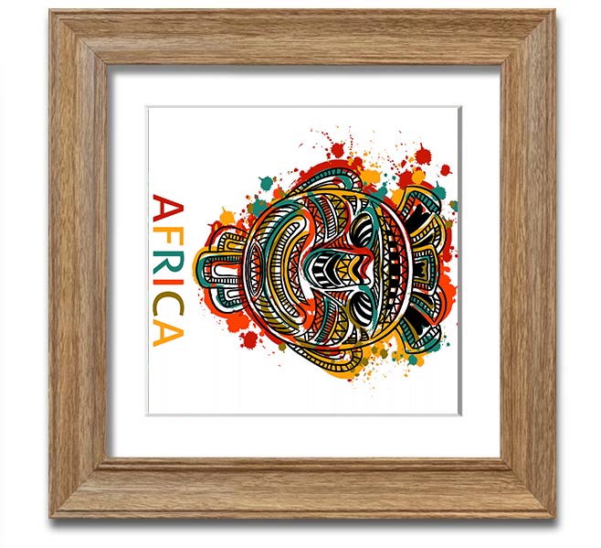 A beautifully framed African mask print showcasing intricate details and vibrant colors, ready to hang.