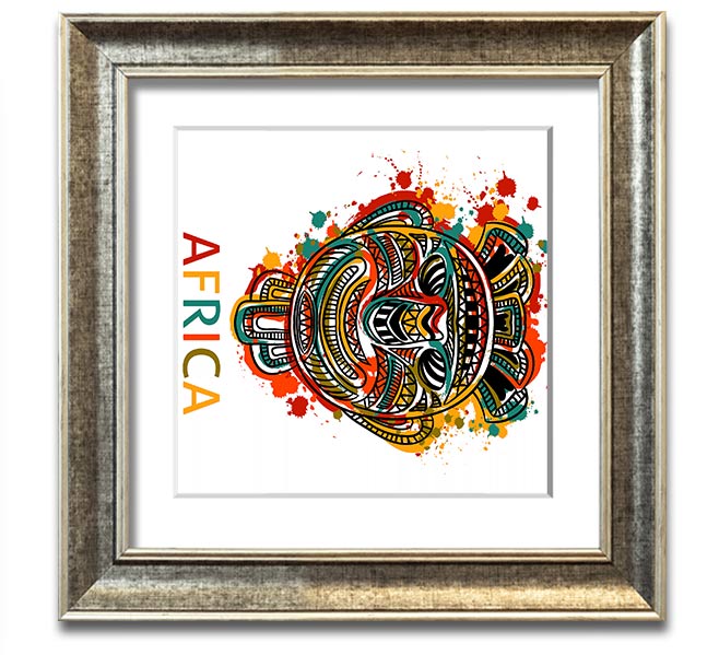 A beautifully framed African mask print showcasing intricate details and vibrant colors, ready to hang.