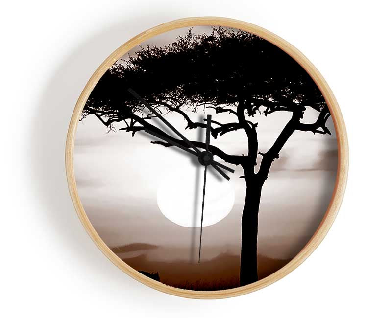 African Safari Brown clock made from natural bamboo with a round face and clear Plexiglas lens, available in multiple colors.