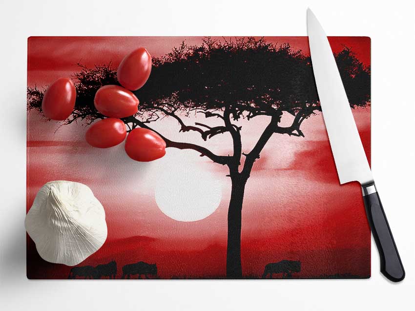 African Safari Red chopping board made from tempered glass with a chinchilla ripple effect and anti-slip feet.