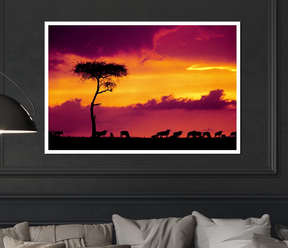 A stunning canvas print of an African sunset over the savannah, showcasing vibrant colors and silhouettes of trees.