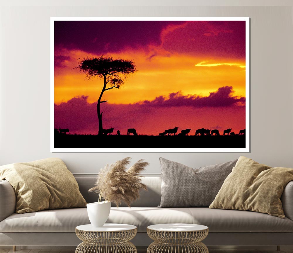 A stunning canvas print of an African sunset over the savannah, showcasing vibrant colors and silhouettes of trees.