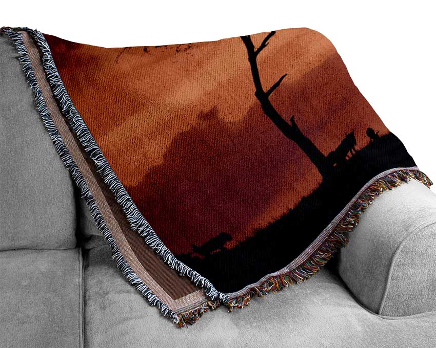 A luxurious African Safari Sunset throw blanket made from 100% cotton, featuring a thermal weave and elegant design, perfect for home decor.